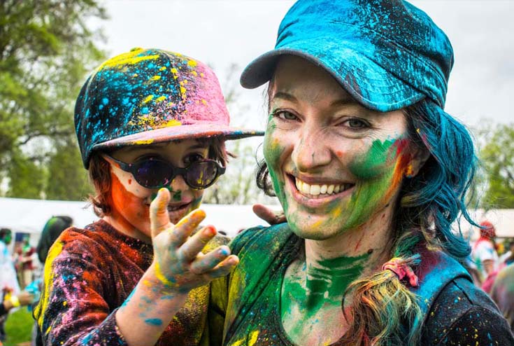 Woman and young boy at festival